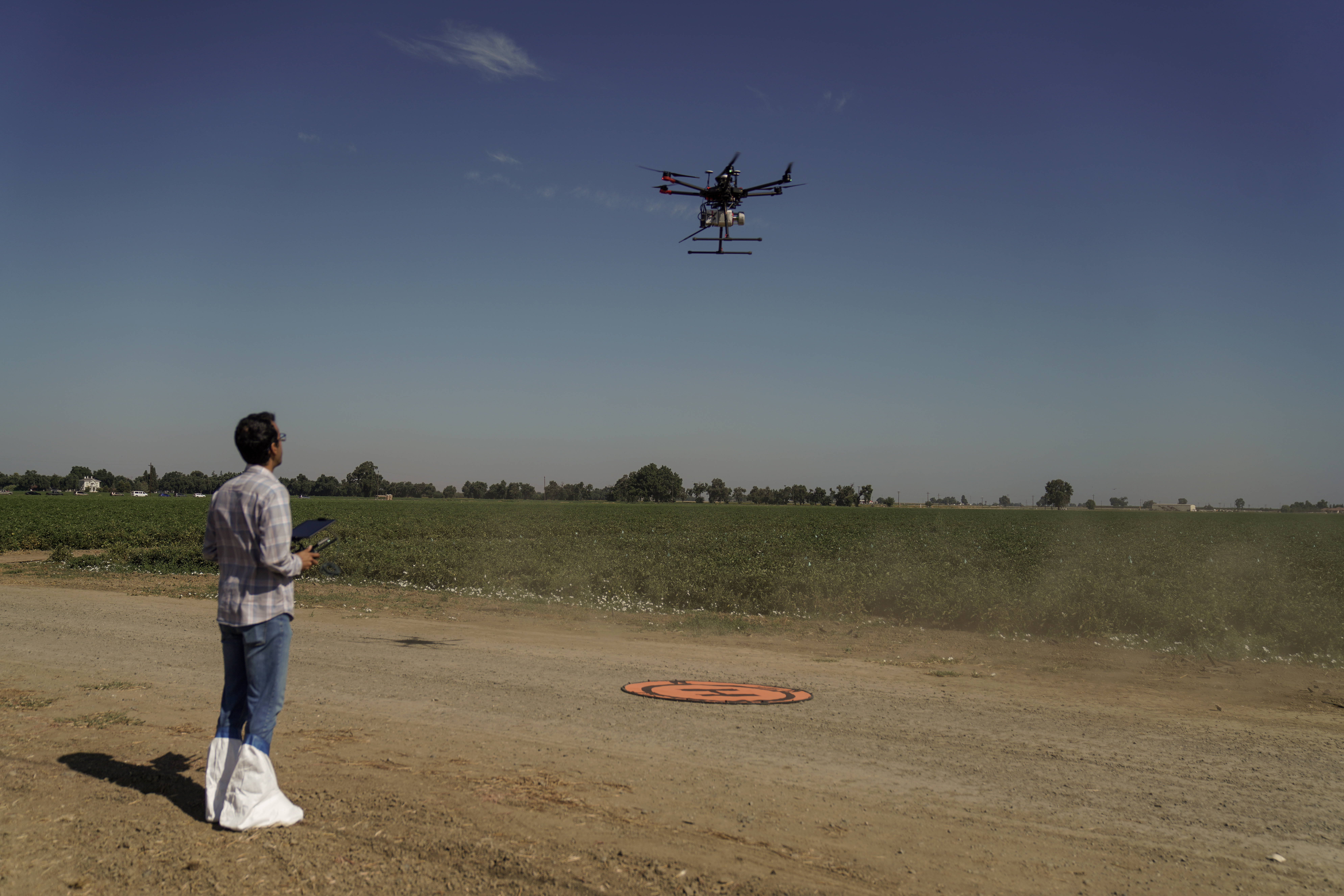 Mohammadreza Narimani operating drone LiDAR system over tomato fields UC Davis Digital Agriculture Laboratory precision agriculture research